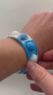 Video of the Sensory Pop Bracelet being used and showing how we do it – colourful tactile fidget accessory for neurodivergent children | The Divergent De