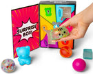 Scrunchems Surprise Box showing six compartments with tear-away windows hiding sensory toys